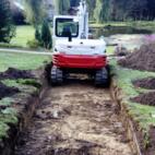 Projekt Gartenparadies: sorgfältige Erdarbeiten für Natursteinweg